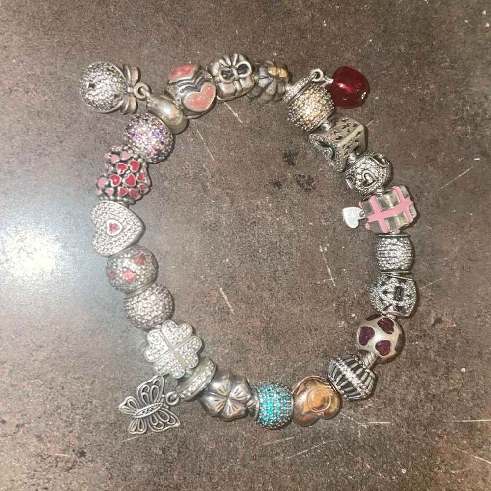 Pandora pink gold heart snake bracelet with lots of beautiful pave charms